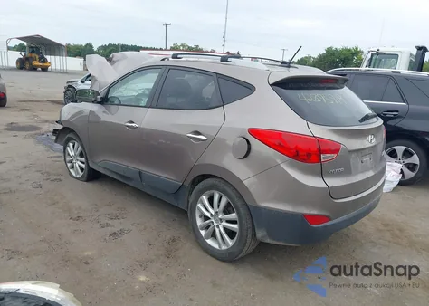 2013 Hyundai Tucson Limited z USA, uszkodzony, nr VIN KM8JU3AC0DU595736